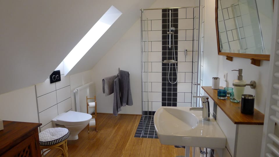 Deluxe Double or Twin Room, Balcony, Garden View | Bathroom | Shower, hair dryer, slippers, towels