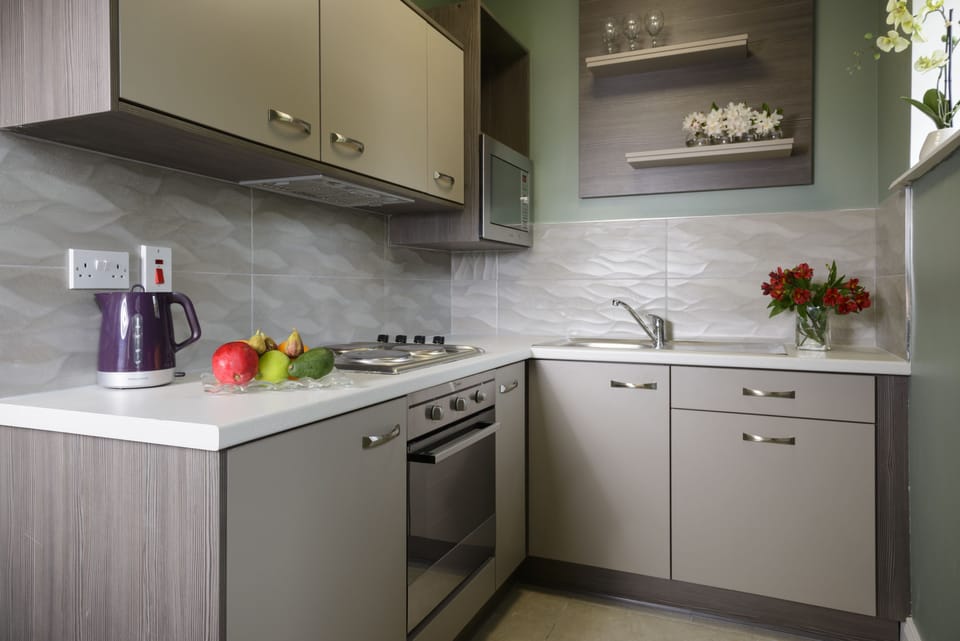 Apartment, 2 Bedrooms | Private kitchen | Coffee/tea maker, full-size fridge, microwave, oven