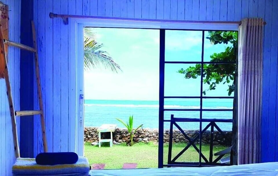 Beach Front Aircon Villa | In-room safe, free WiFi, bed sheets