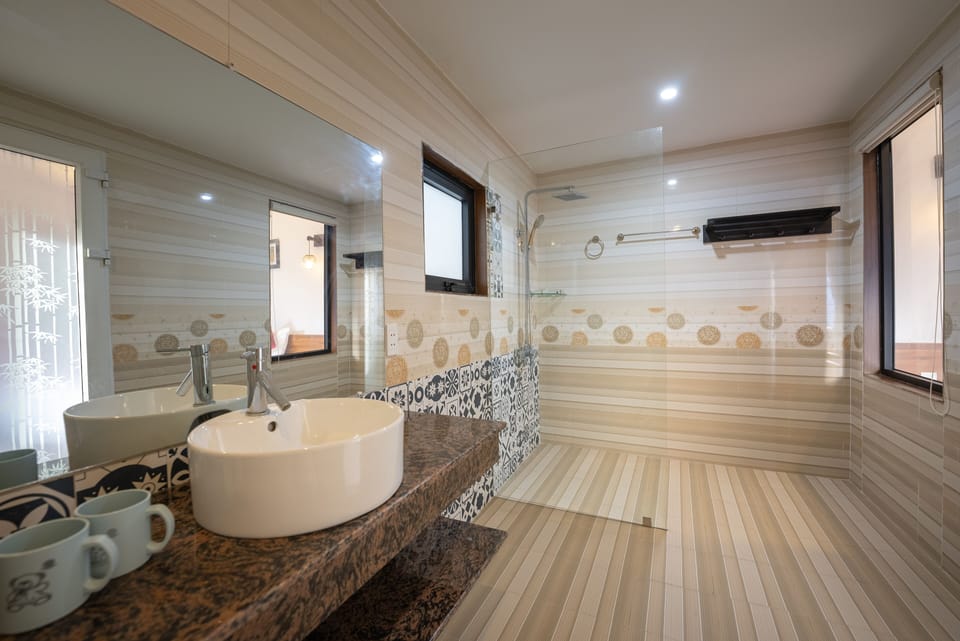 Family Room, Balcony | Bathroom | Shower, free toiletries, hair dryer, slippers