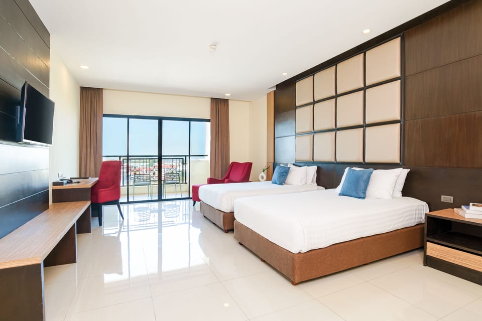 Grand Room, Terrace, Partial Ocean View | In-room safe, desk, blackout drapes, iron/ironing board