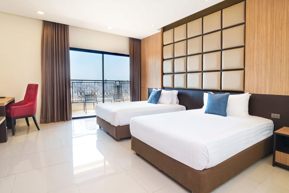 Family Room, 2 Bedrooms, Partial Sea View | In-room safe, desk, blackout drapes, iron/ironing board