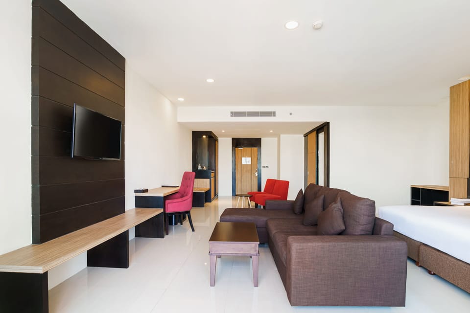 Premium Grand Suite with Terrace and Partial View | In-room safe, desk, blackout drapes, iron/ironing board
