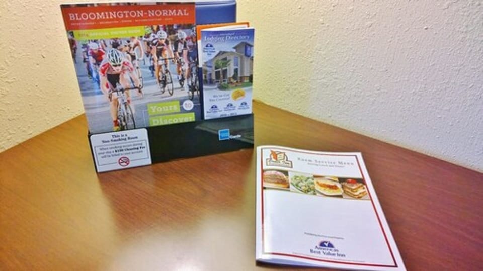 Desk, laptop workspace, blackout drapes, iron/ironing board