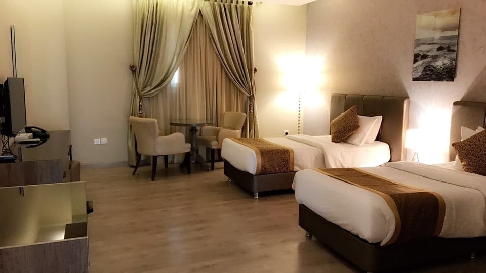 Royal Golden Marina Suite (Royal Suite) | Living room | 40-inch LED TV with satellite channels, TV