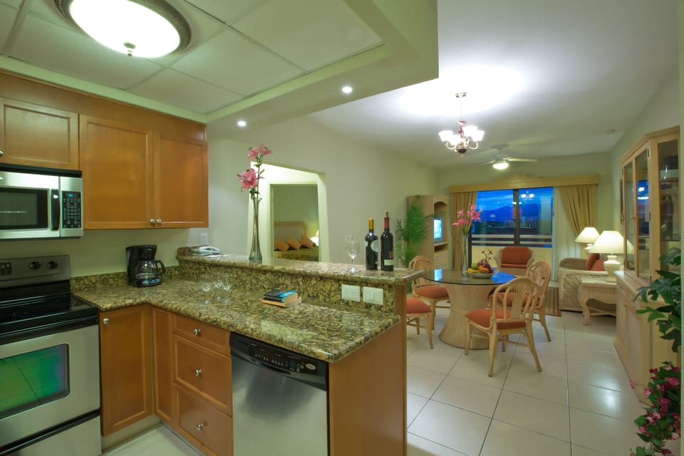 Standard Suite, 2 Bedrooms | Private kitchen | Fridge, microwave, coffee/tea maker, cookware/dishes/utensils