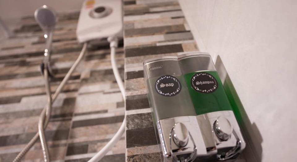 Standard Double Room, Private Bathroom | Bathroom amenities | Shower, hair dryer, towels, soap