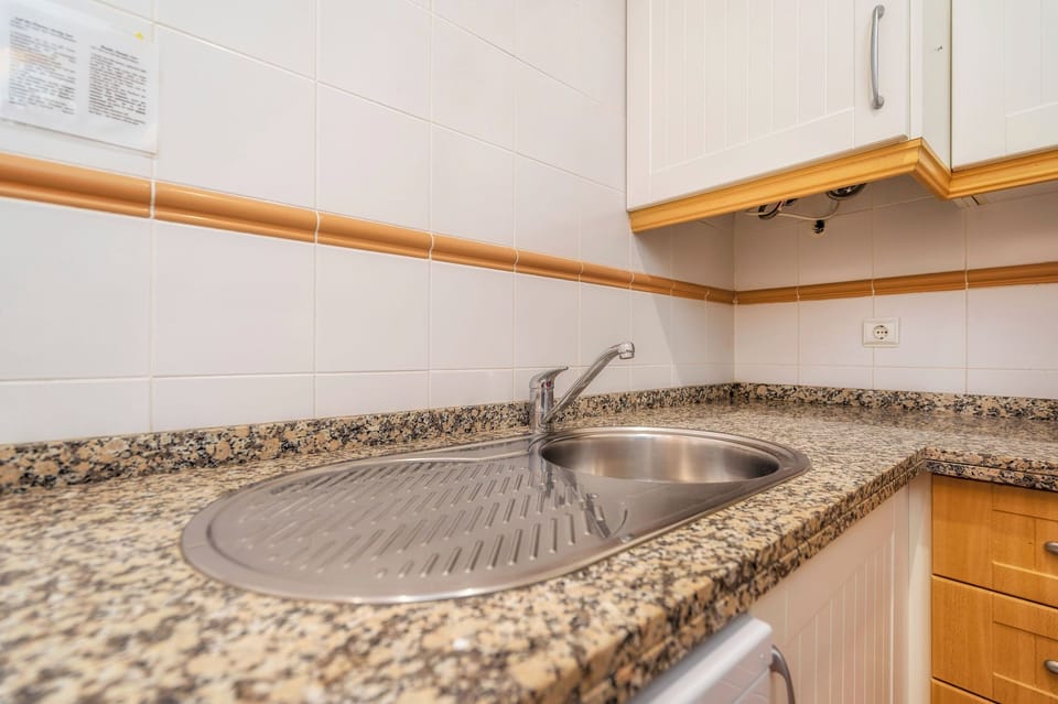 Standard Apartment, 2 Bedrooms, Pool View | Private kitchen | Coffee/tea maker, fridge, microwave, stovetop