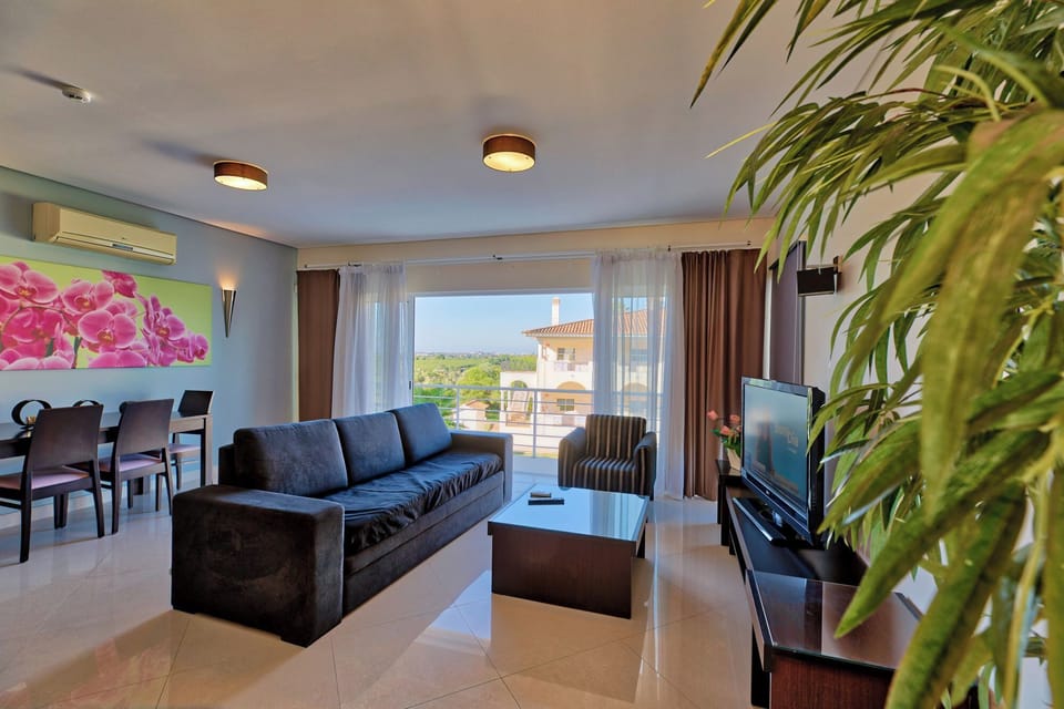 Standard Apartment, 1 Bedroom (4 people) | Living area | Flat-screen TV