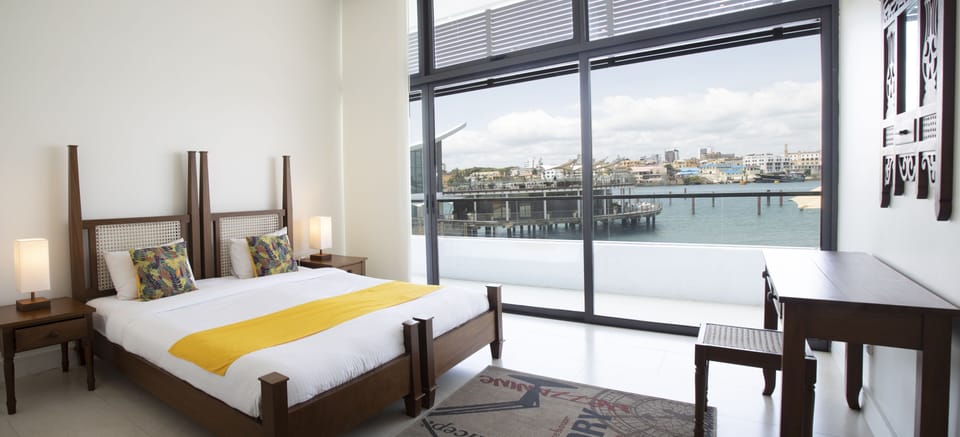 Pool Side Grand Suite | In-room safe, desk, laptop workspace, iron/ironing board