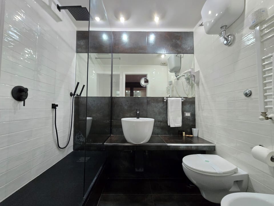 Room, Garden View, Garden Area (Costantino) | Bathroom | Shower, free toiletries, hair dryer, slippers