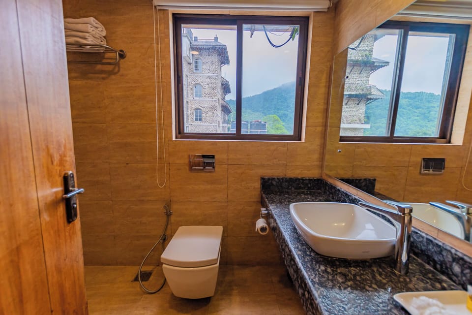 Rainfall showerhead, free toiletries, hair dryer, slippers