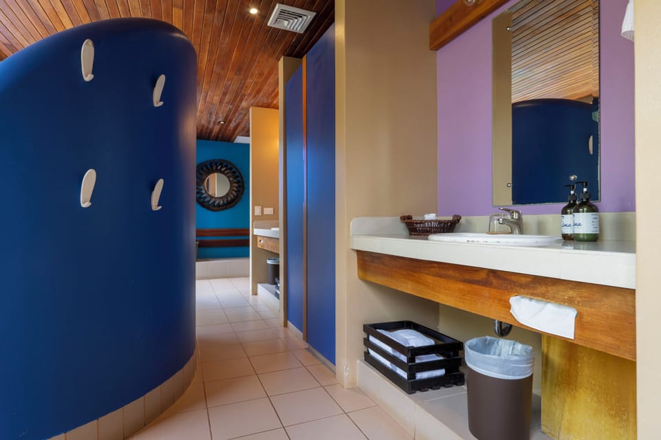 Deluxe Beachfront Villa 1 King Bed plus | Bathroom | Shower, rainfall showerhead, eco-friendly toiletries, hair dryer