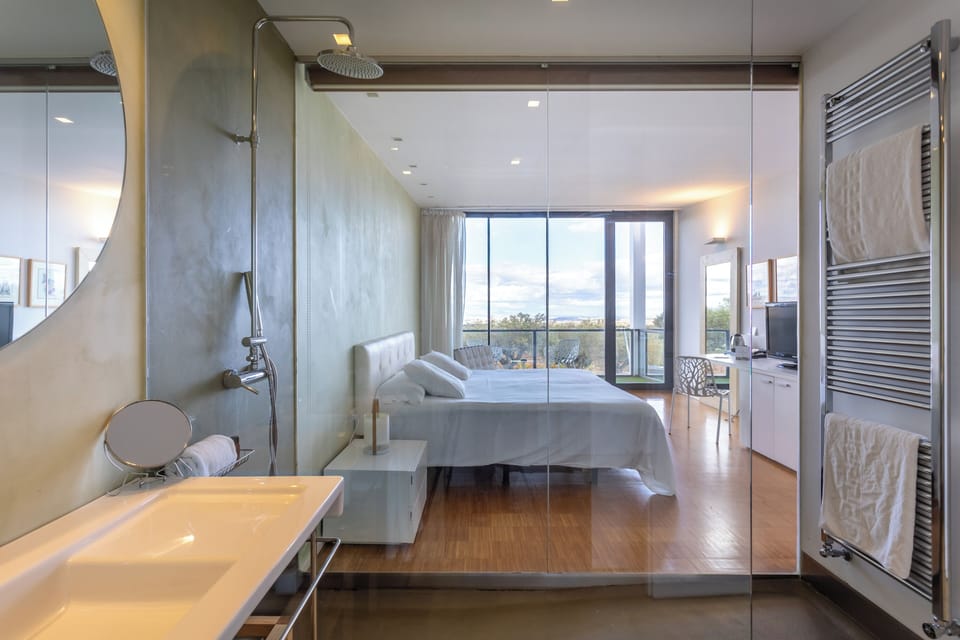 Superior Double Room | Minibar, in-room safe, desk, blackout drapes