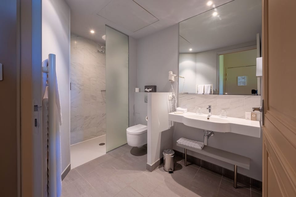 Shower, free toiletries, hair dryer, bathrobes