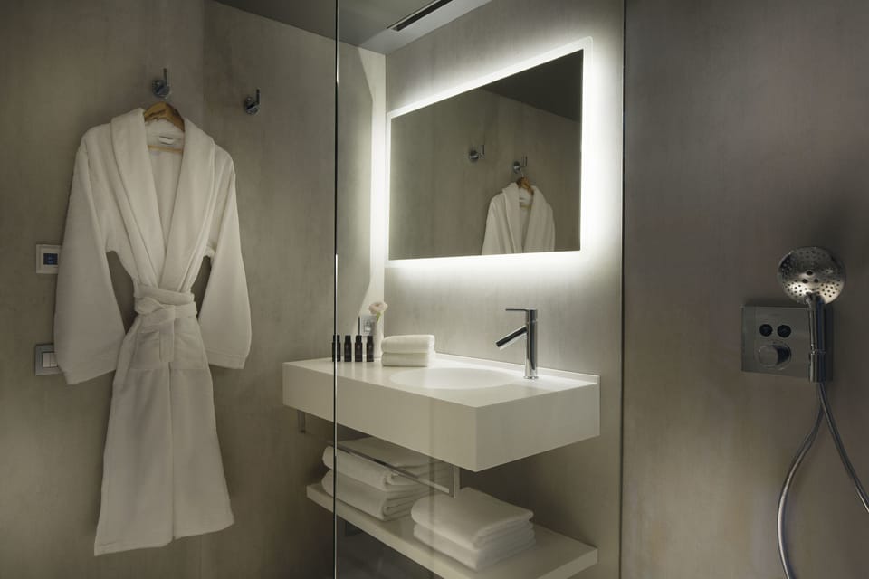 Drawing Superior | Bathroom | Rainfall showerhead, free toiletries, hair dryer, slippers
