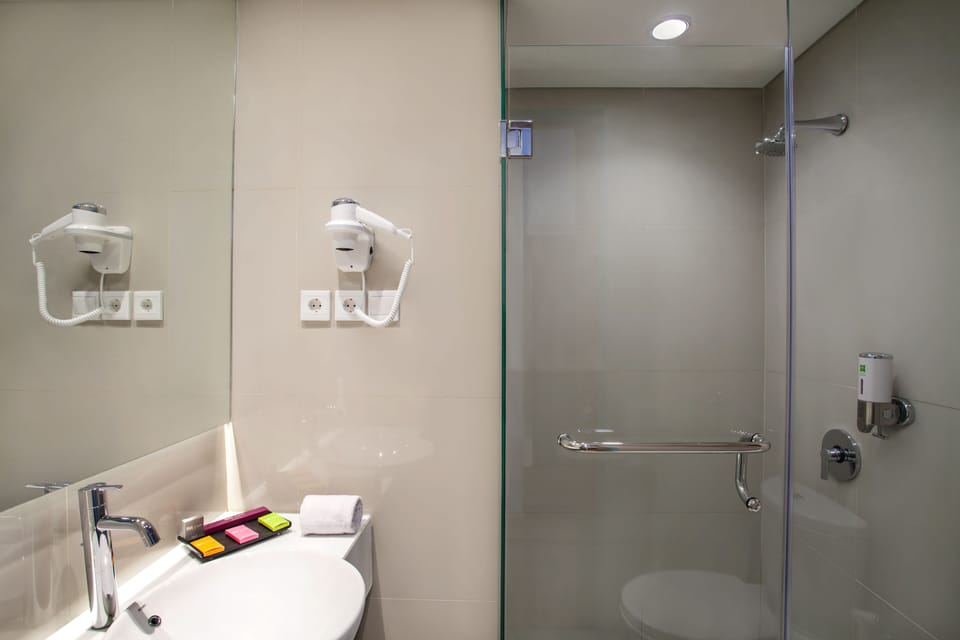 Shower, rainfall showerhead, eco-friendly toiletries, hair dryer