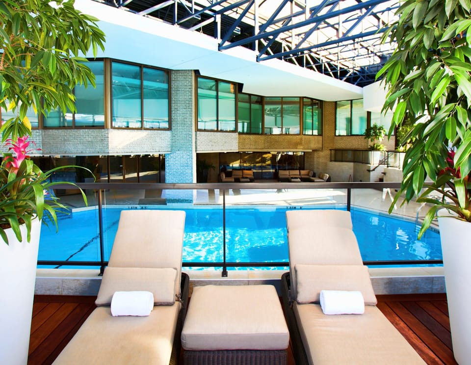 Indoor pool, open 2:00 PM to 8:00 PM, pool umbrellas, sun loungers
