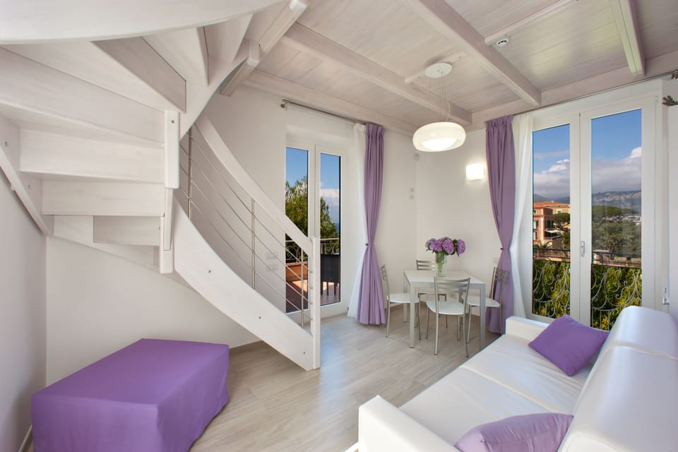 Deluxe Duplex, Sea View (Lavanda) | Living area | Flat-screen TV