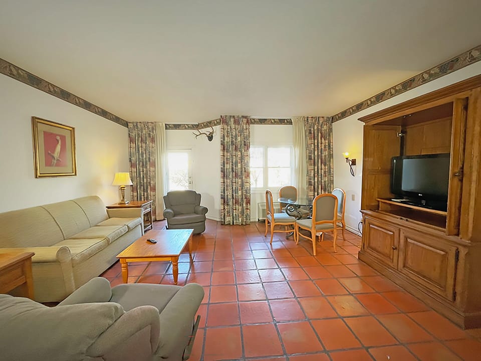 Suite, 2 Queen Beds | Living area | Flat-screen TV