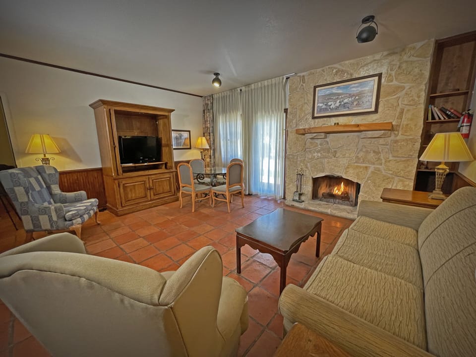 Suite, 1 King Bed | Living area | Flat-screen TV