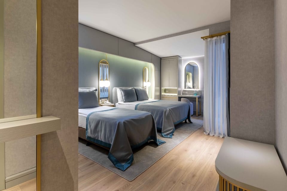 Egyptian cotton sheets, premium bedding, minibar, in-room safe