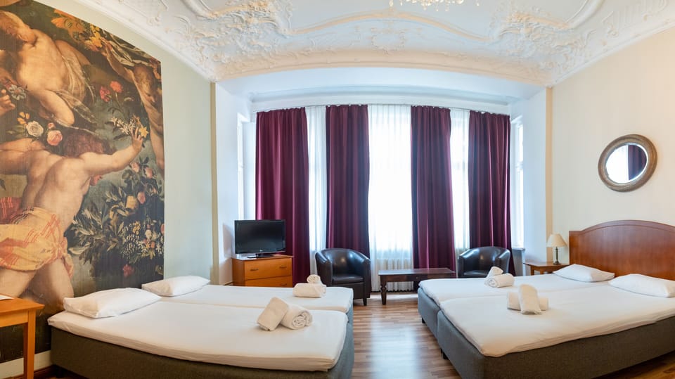Premium bedding, in-room safe, desk, soundproofing