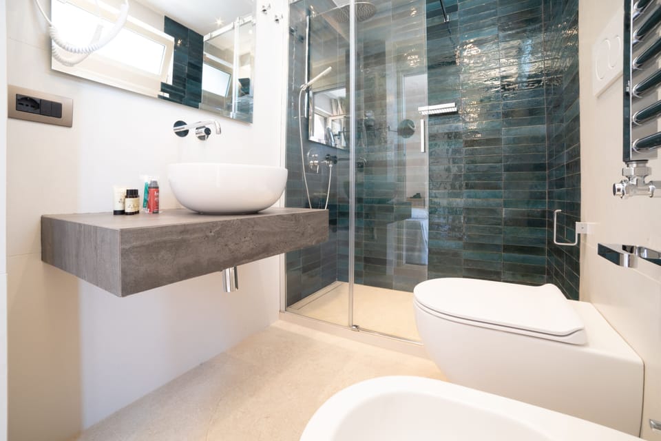 Family Double or Twin Room | Minibar, in-room safe, desk, laptop workspace