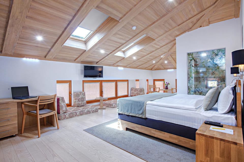 Junior Studio Suite, 1 Bedroom, City View | Minibar, in-room safe, desk, laptop workspace