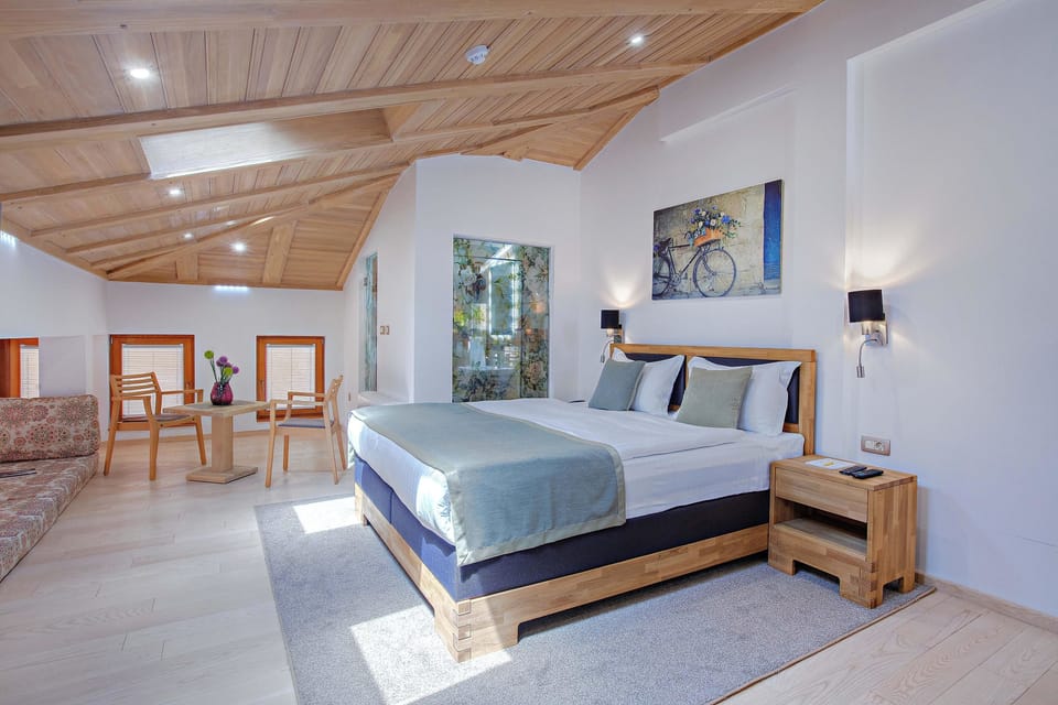 Junior Studio Suite, 1 Bedroom, City View | Minibar, in-room safe, desk, laptop workspace