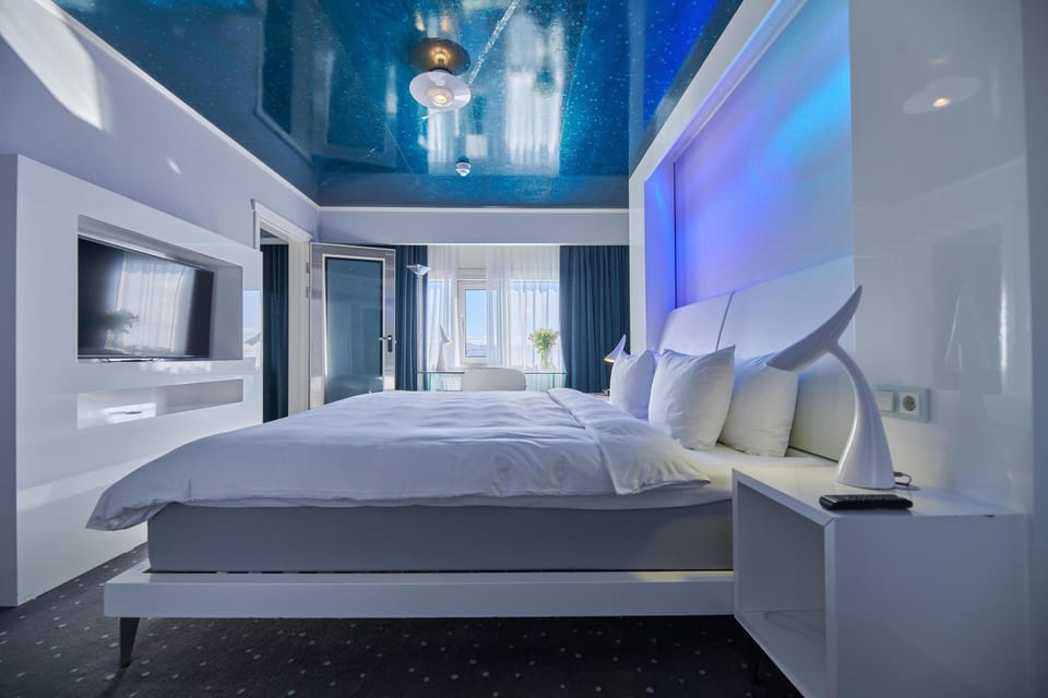 Suite (Polar - Panoramic Fjord View) | Hypo-allergenic bedding, minibar, in-room safe, laptop workspace