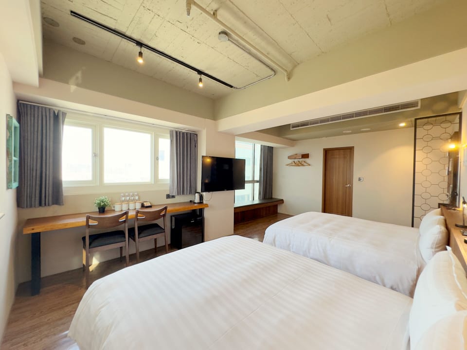 Family Quadruple Room | 1 bedroom, desk, laptop workspace, blackout drapes