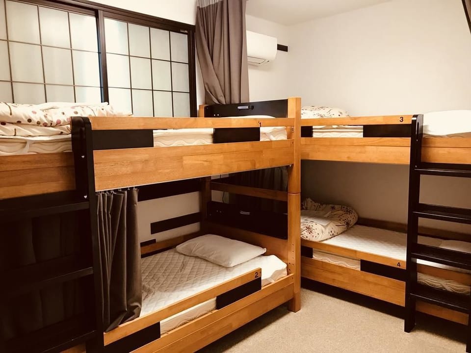 Family Room, 6 Bedrooms, Non Smoking, City View | Soundproofing, free WiFi, bed sheets