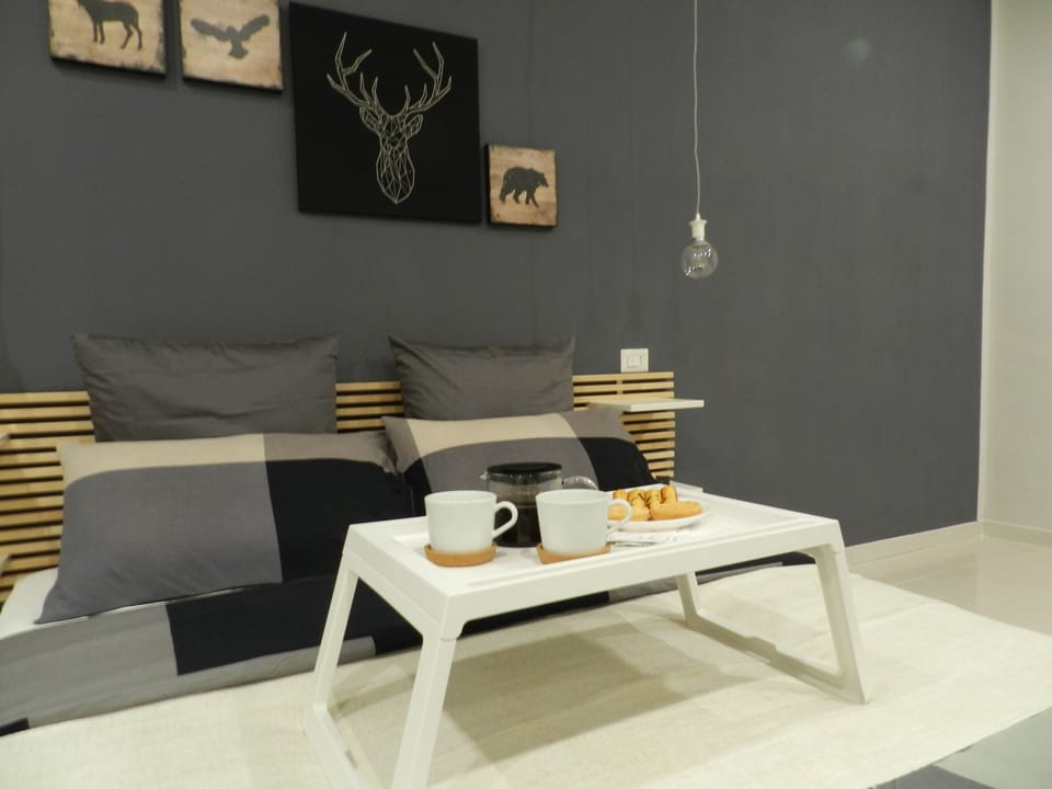 Family Quadruple Room, 1 Bedroom, Ensuite, City View | Coffee and/or coffee maker