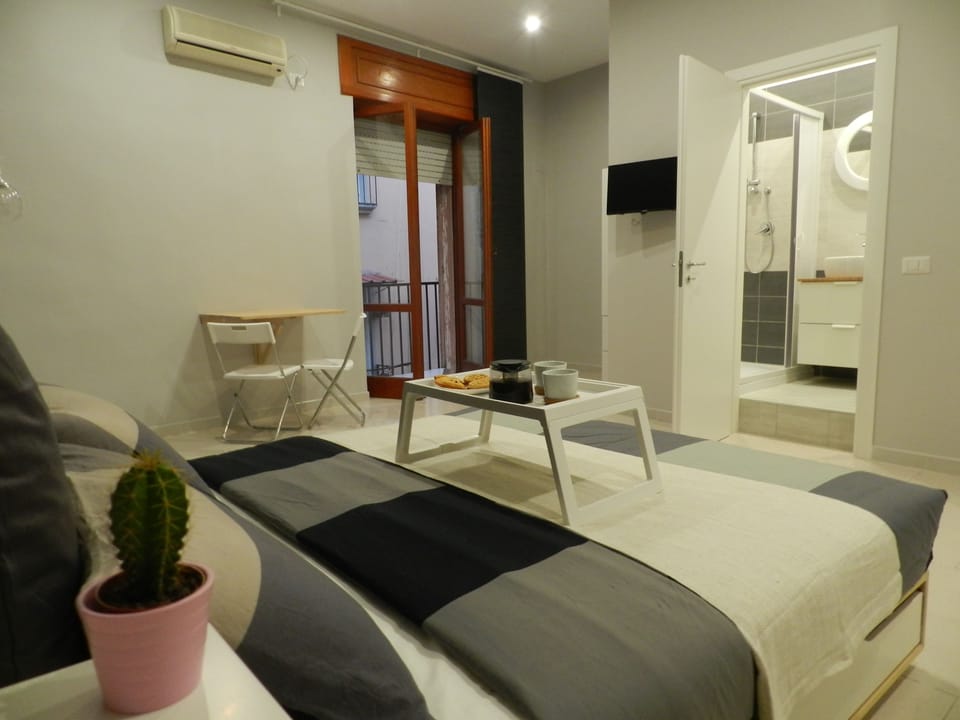 Family Quadruple Room, 1 Bedroom, Ensuite, City View | Desk, soundproofing, free WiFi, bed sheets