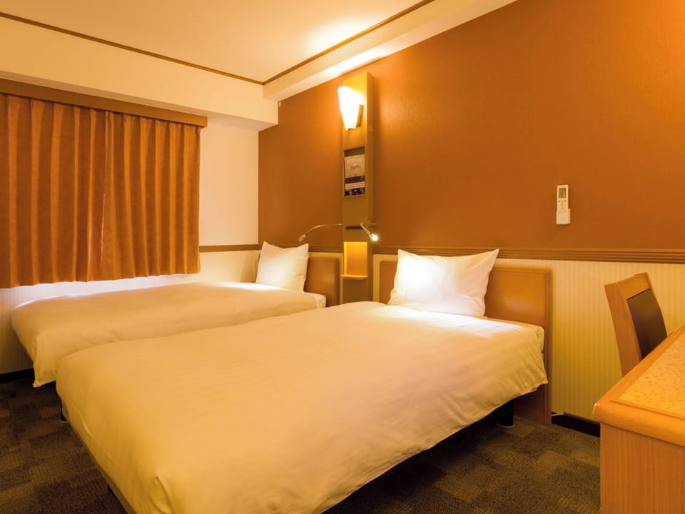 Down comforters, desk, blackout drapes, bed sheets