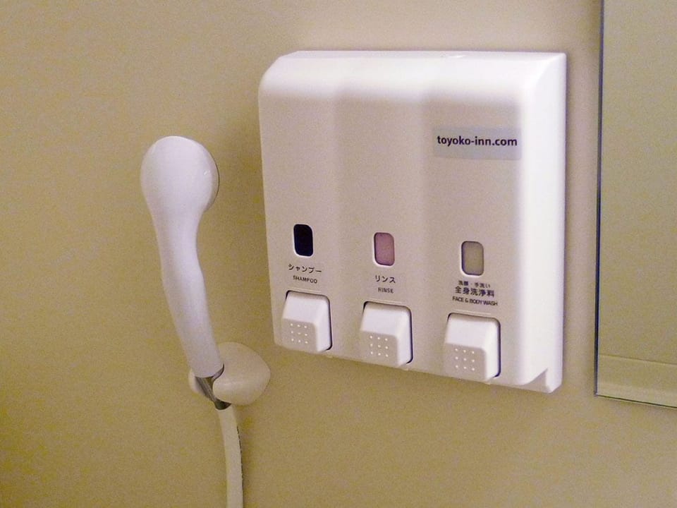 Combined shower/tub, slippers, electronic bidet, towels