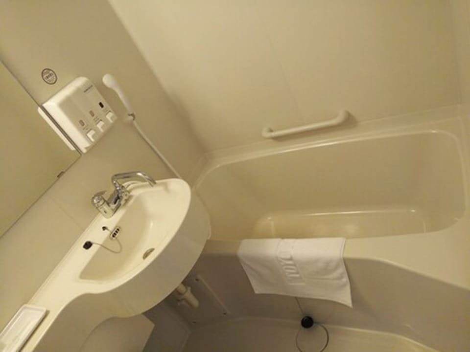 Combined shower/tub, hair dryer, bathrobes, slippers