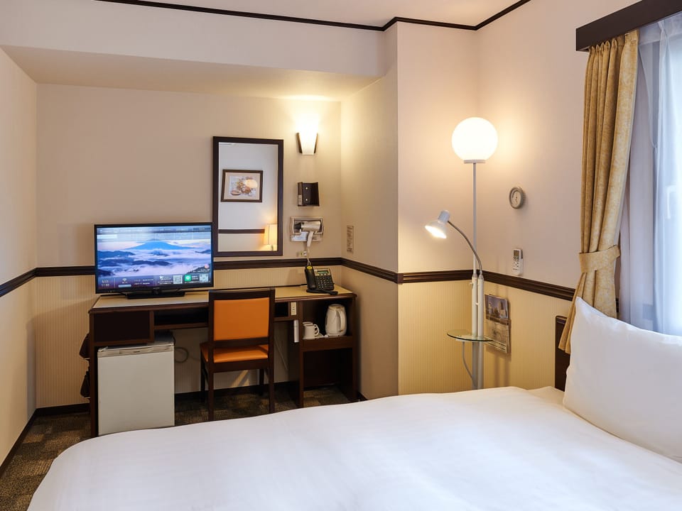 Desk, blackout drapes, WiFi (free), bed sheets