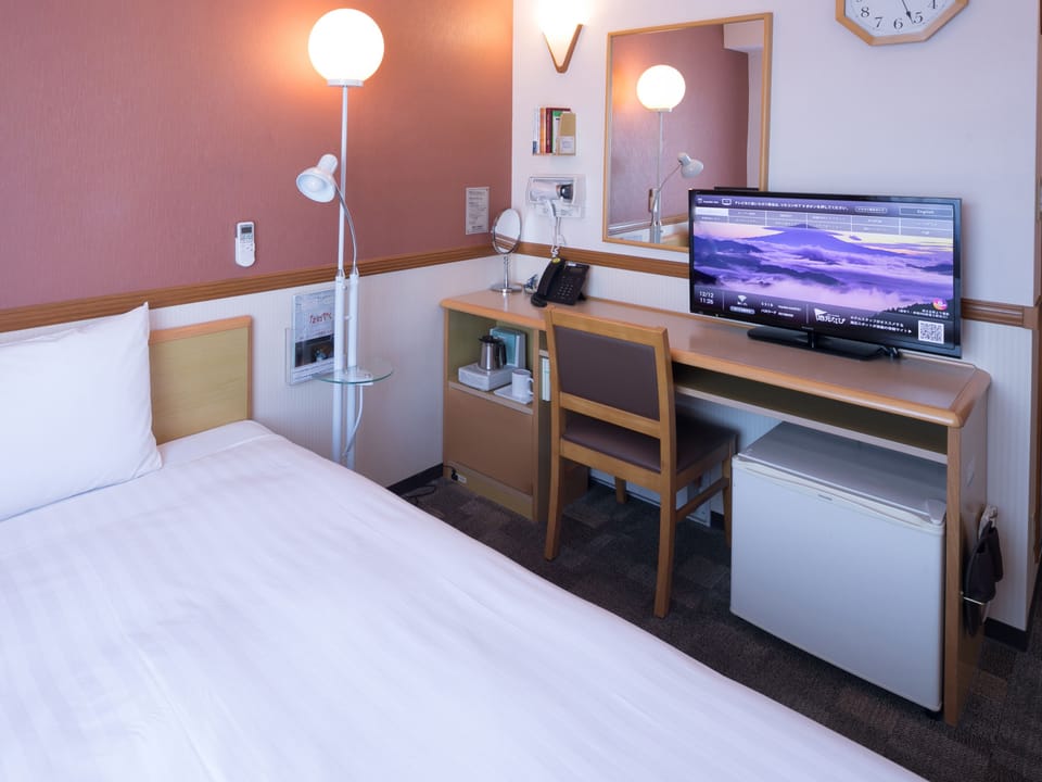 Desk, free WiFi, bed sheets