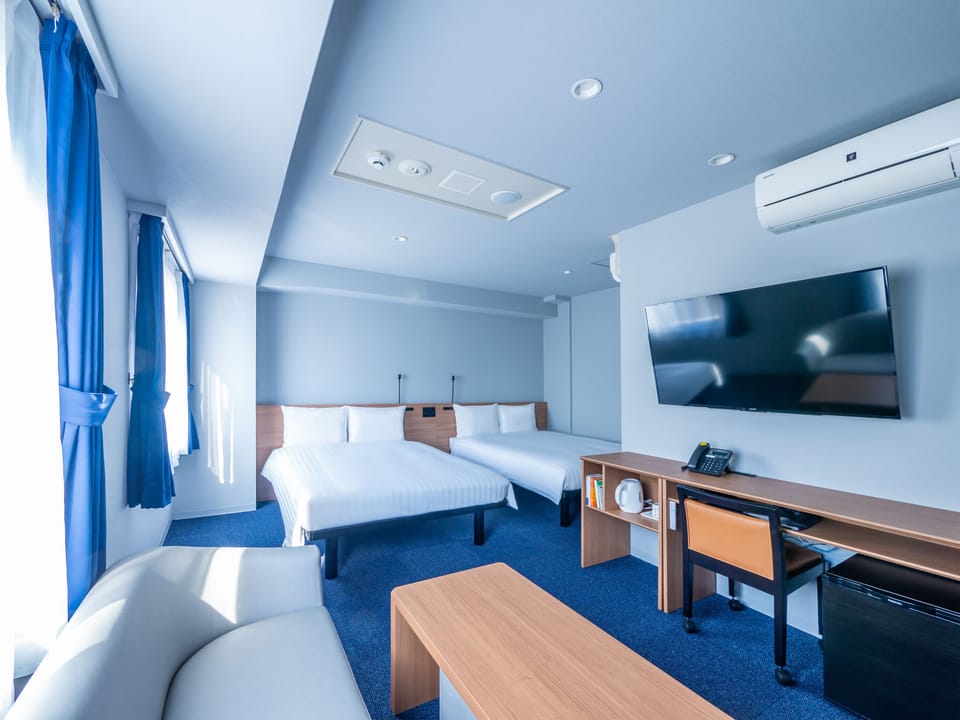 Deluxe Twin Room, Non Smoking | Blackout drapes, iron/ironing board, free WiFi, bed sheets