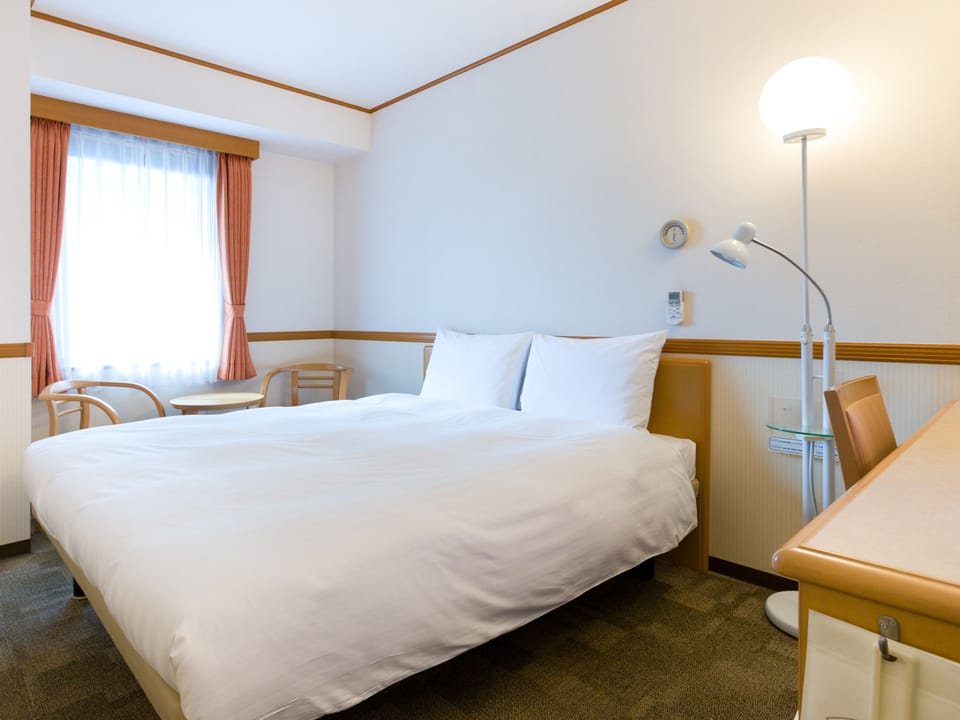 Desk, laptop workspace, free wired internet, bed sheets