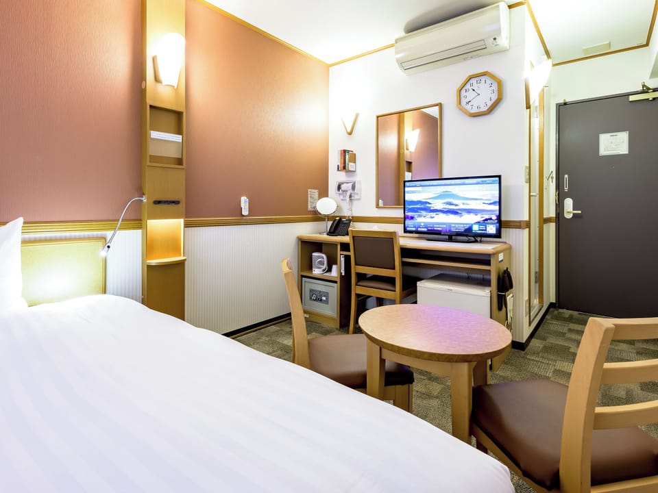 Blackout drapes, iron/ironing board, free WiFi, bed sheets
