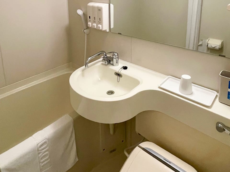 Combined shower/tub, hair dryer, bathrobes, slippers