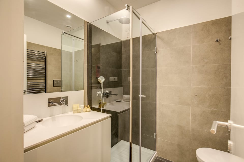 Shower, rainfall showerhead, eco-friendly toiletries, hair dryer