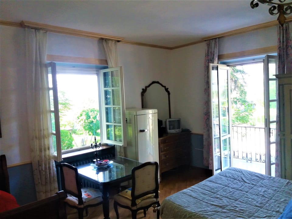 Deluxe Triple Room, Balcony, Mountainside | 1 bedroom, down comforters, minibar, individually furnished