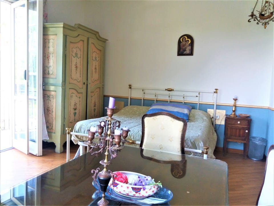 Deluxe Triple Room, Balcony, Mountainside | 1 bedroom, down comforters, minibar, individually furnished