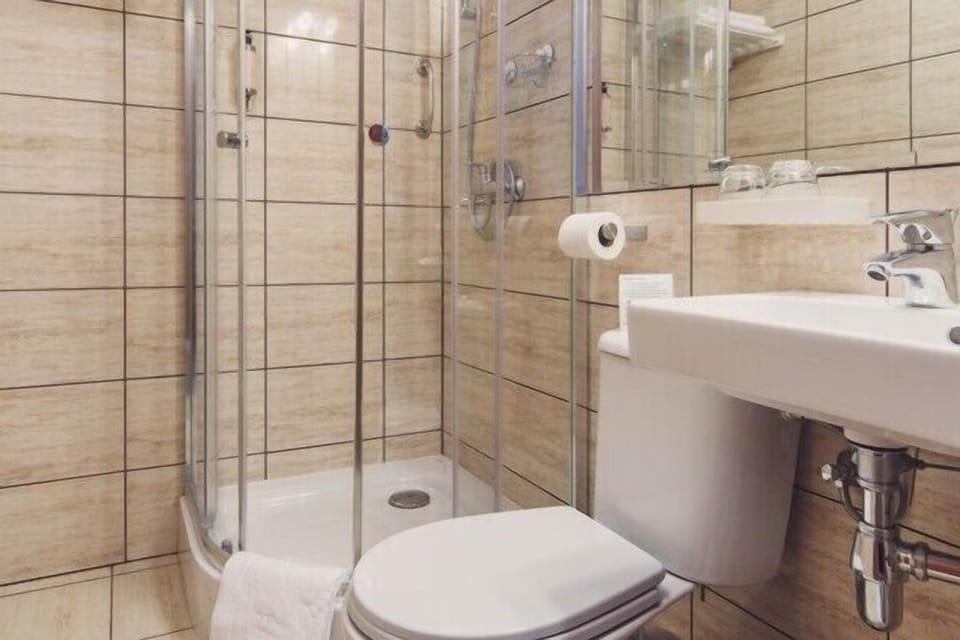 Shower, free toiletries, hair dryer, towels