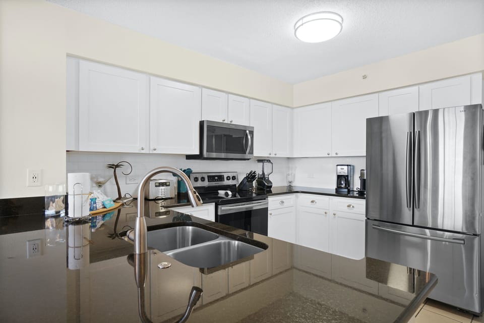 Condo, 2 Bedrooms, Ocean View (1002) | Private kitchen | Fridge, microwave, oven, stovetop