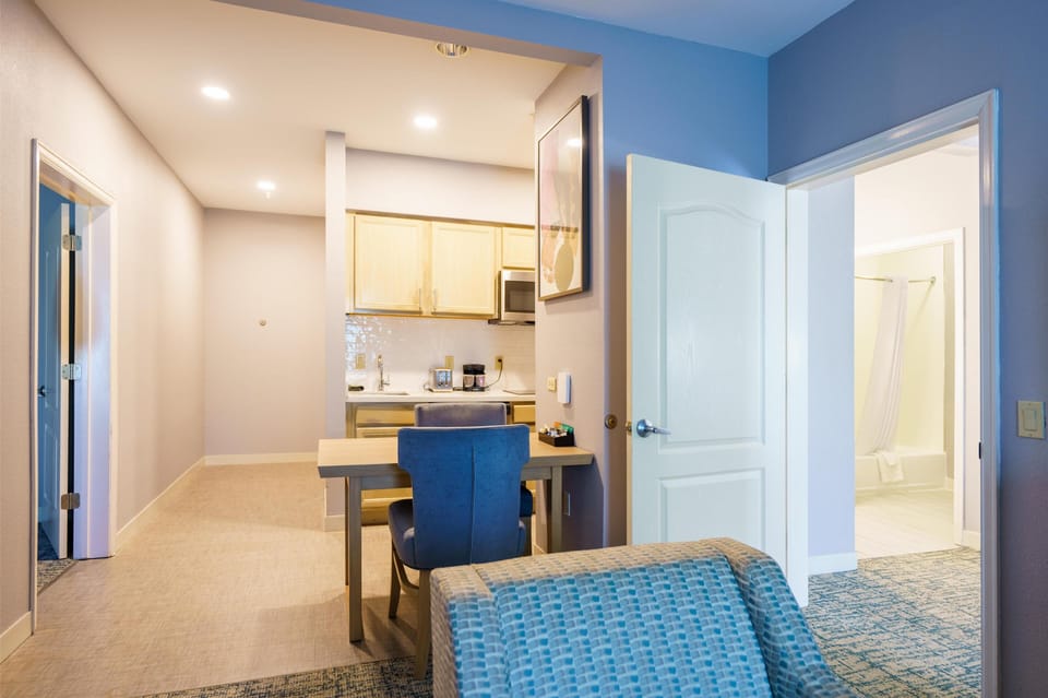 Suite, Non Smoking | Private kitchen | Fridge, microwave, coffee/tea maker, cookware/dishes/utensils